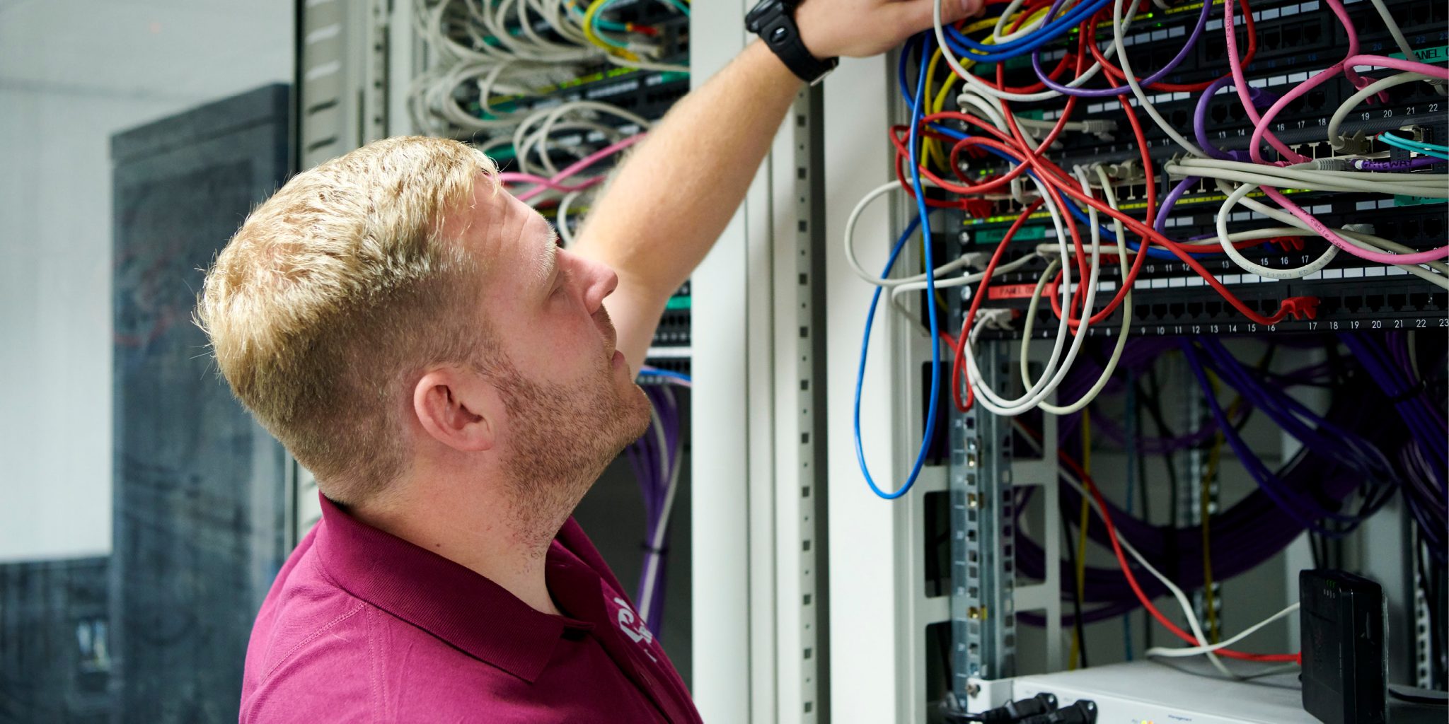 ICT worker working on server