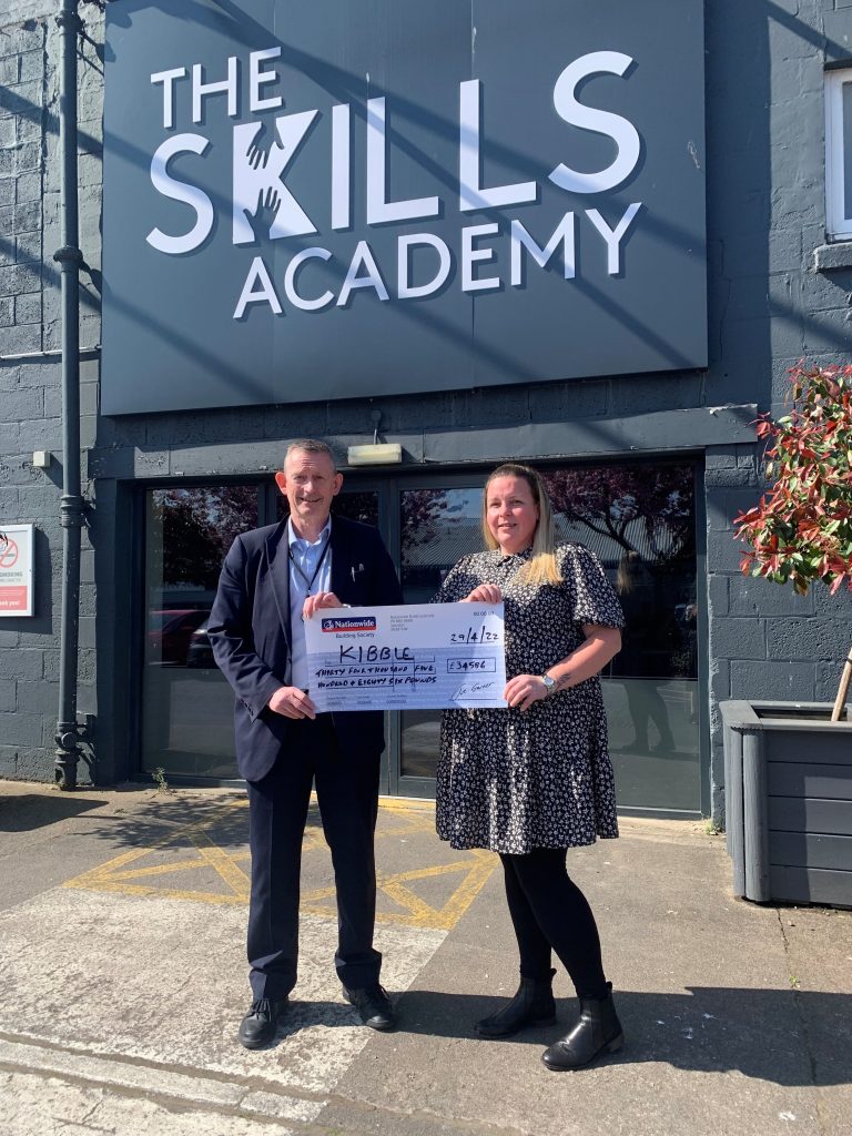 Nationwide Paisley Branch Manager, Ronnie Girvan presenting the cheque to Employability and Tenancy Officer, Gillian Tod. 