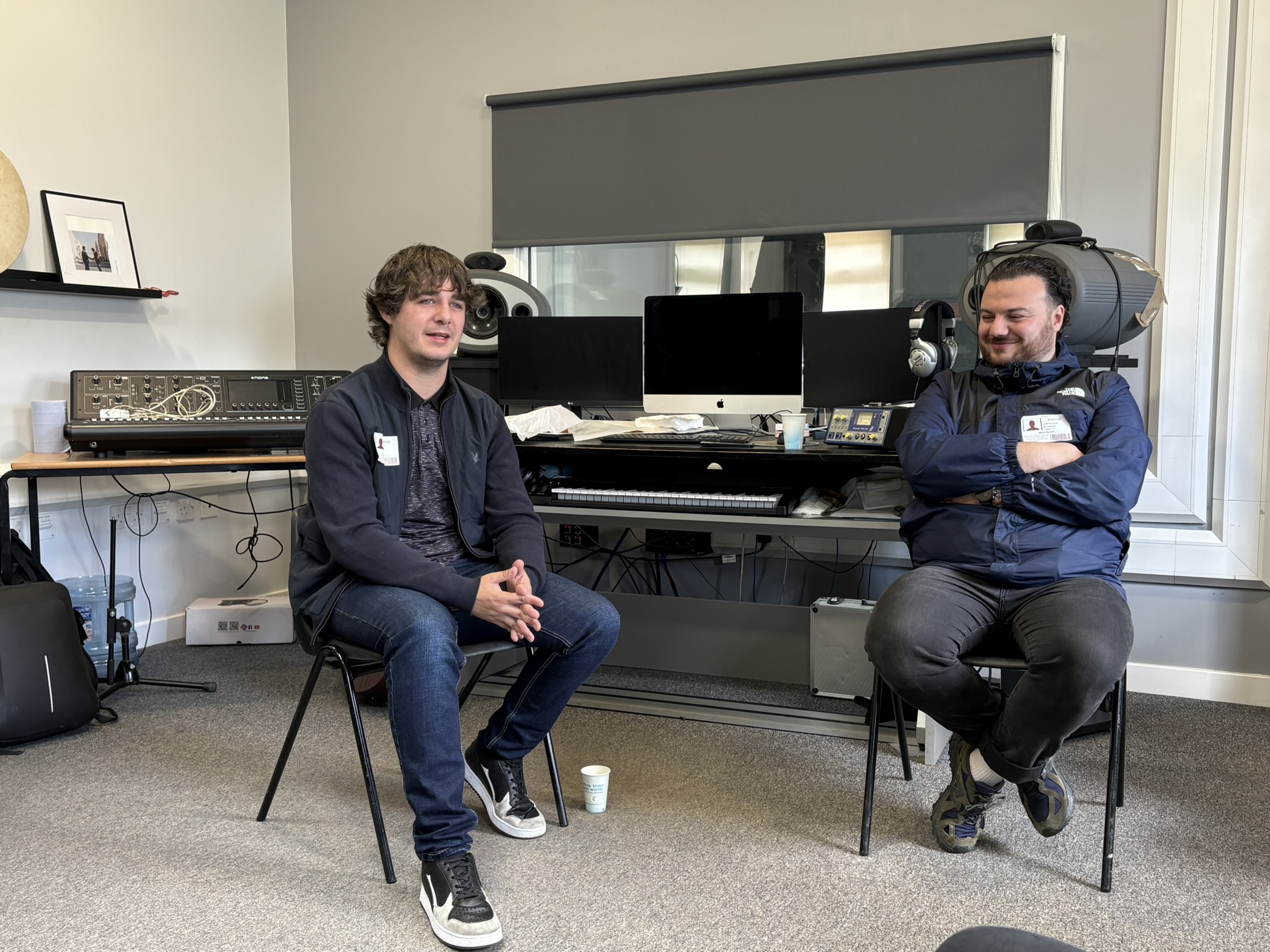Brad Kella and Tour Manager in music classroom